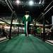 Huron's last graduate Zibo Zou, wearing the ceremonial rat's tail, walks up the ramp to receive his diploma, Wednesday, June 5.
Courtney Sacco I AnnArbor.com 
 
